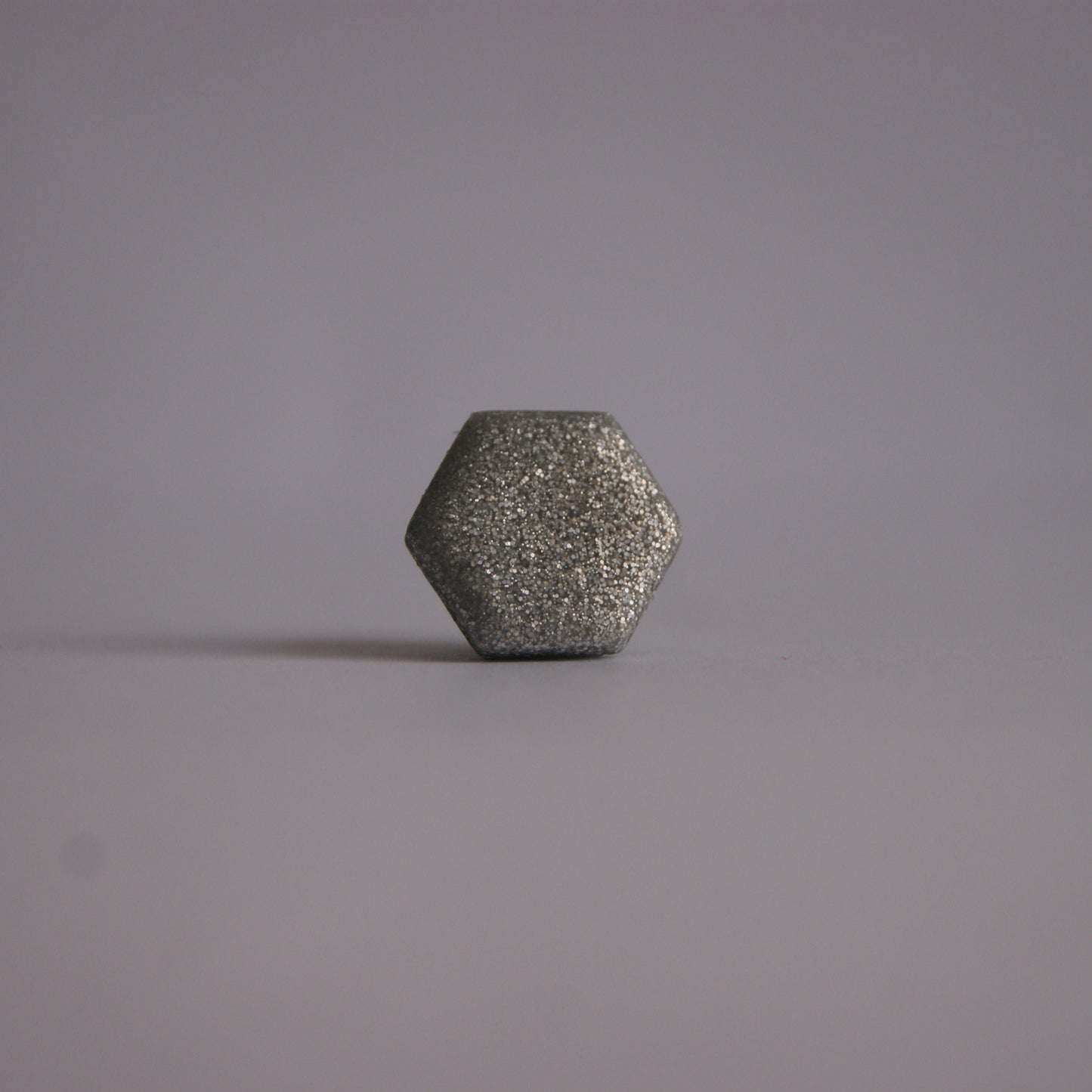 Kavajpin i glittrig silver