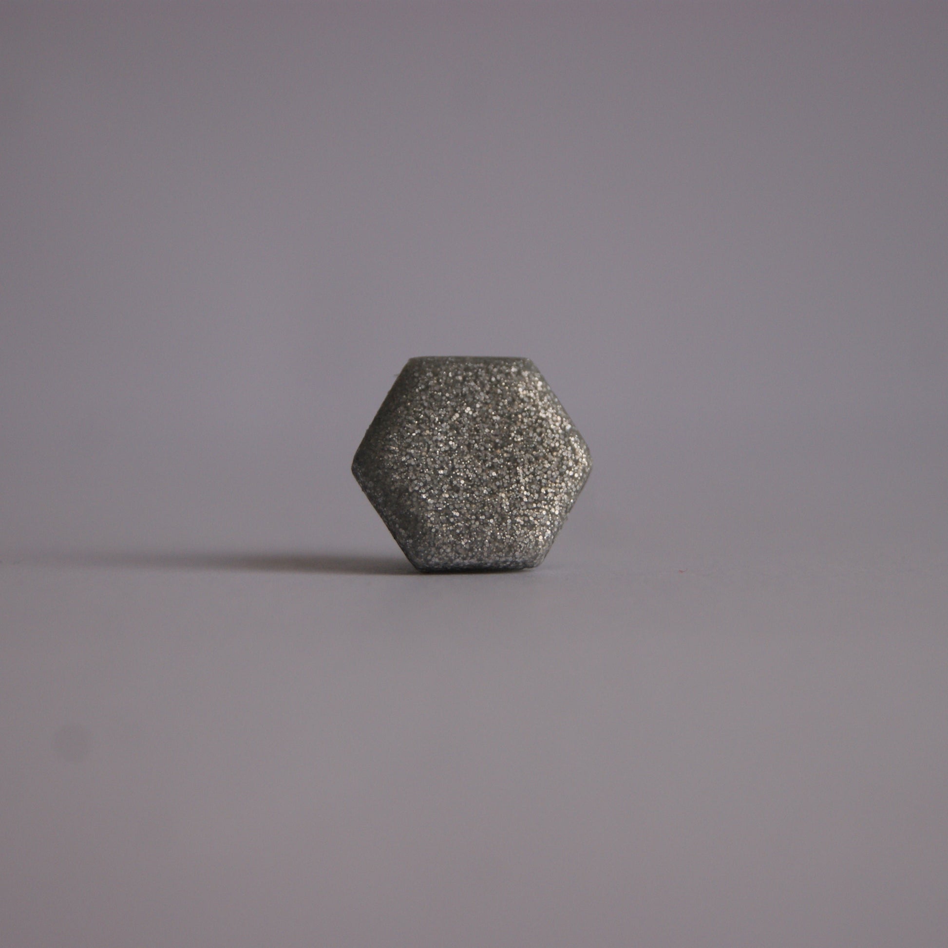 Kavajpin i glittrig silver